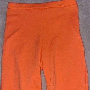 neon orange biker shorts